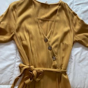 Rebellion, crossbody jumper with sleeves, buttons and a zipper for a close fit.